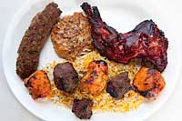 Platter with Chicken Tikka Leg, Chicken Boti, Chapli Checken, Tikka Beef, Seekh Kabab Beef.